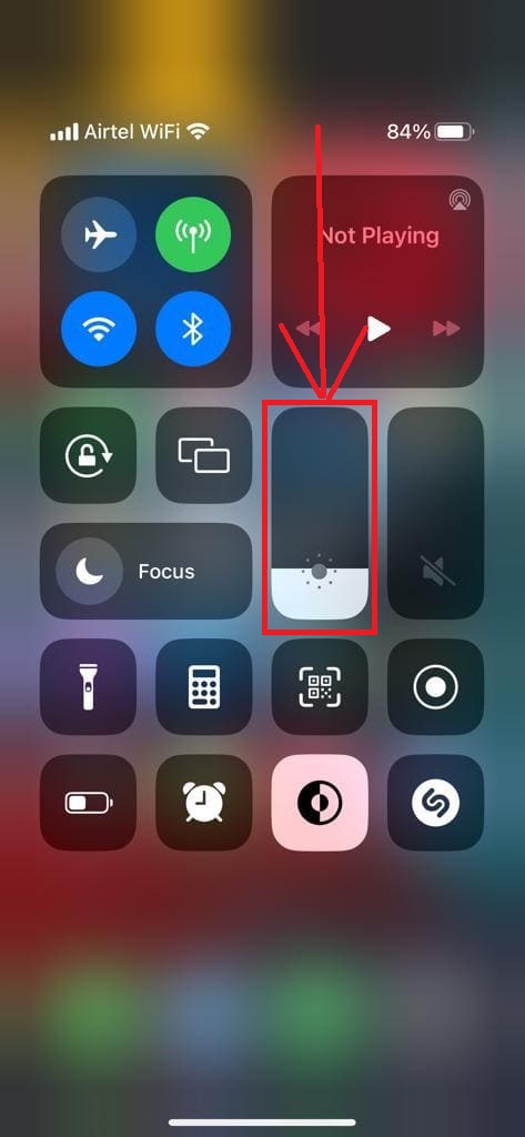 Solve Charging on Hold on iPhone by reducing brightness